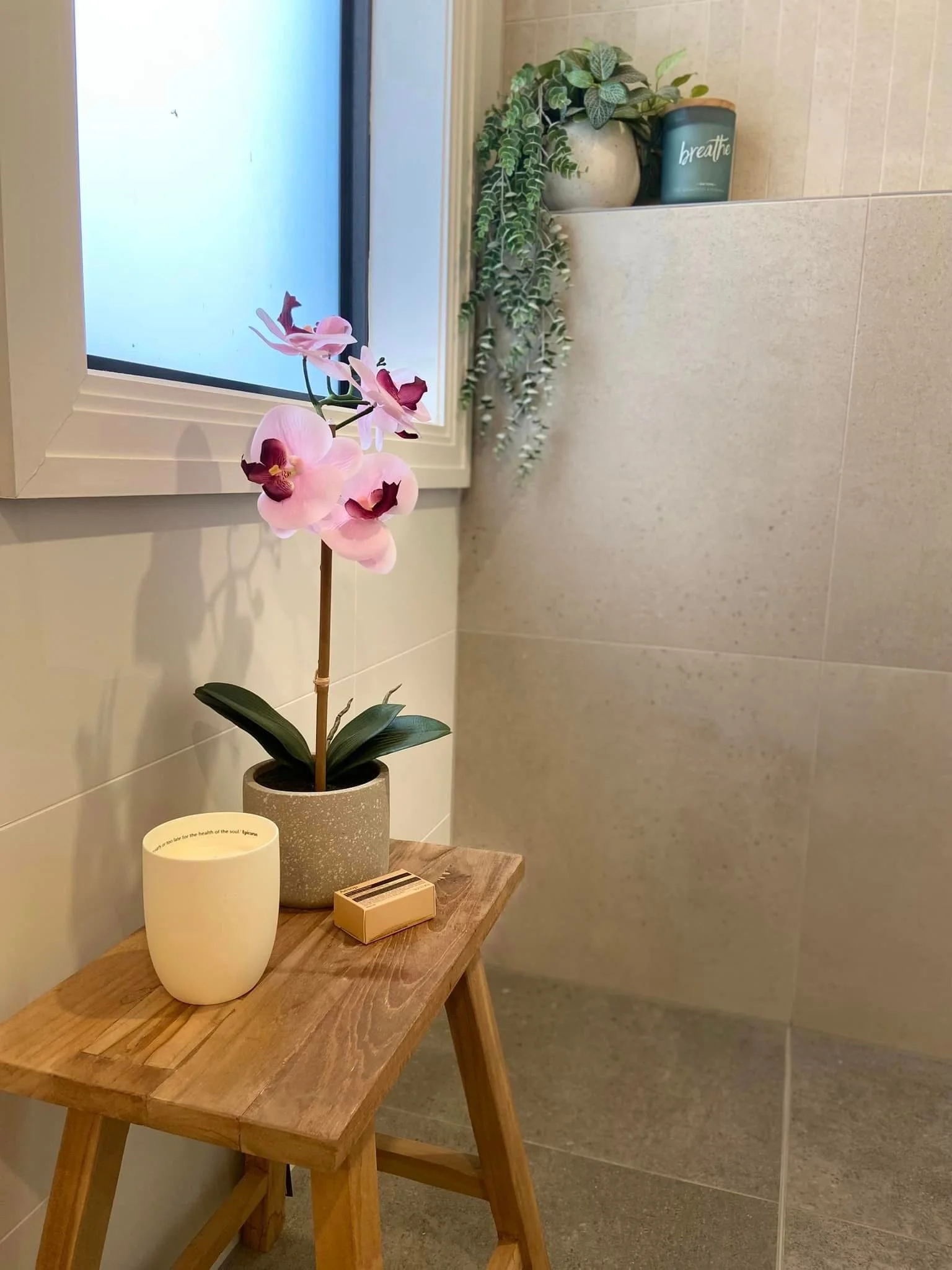 Adam Beaumont's tiling craftsmanship in a natural light bathroom renovation